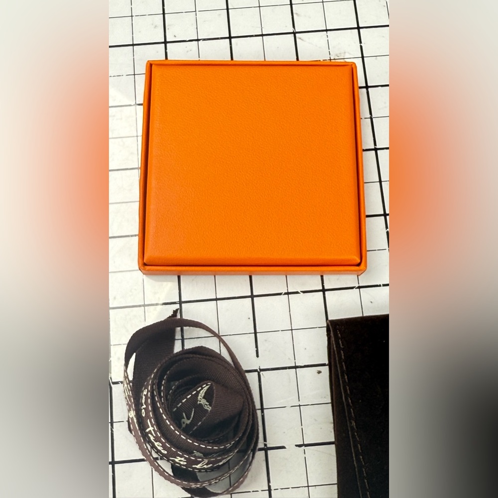 Hermes Orange and Black Storage Box. 3 by 3 inches, ribbon, brown pouch. - Picture 5 of 7